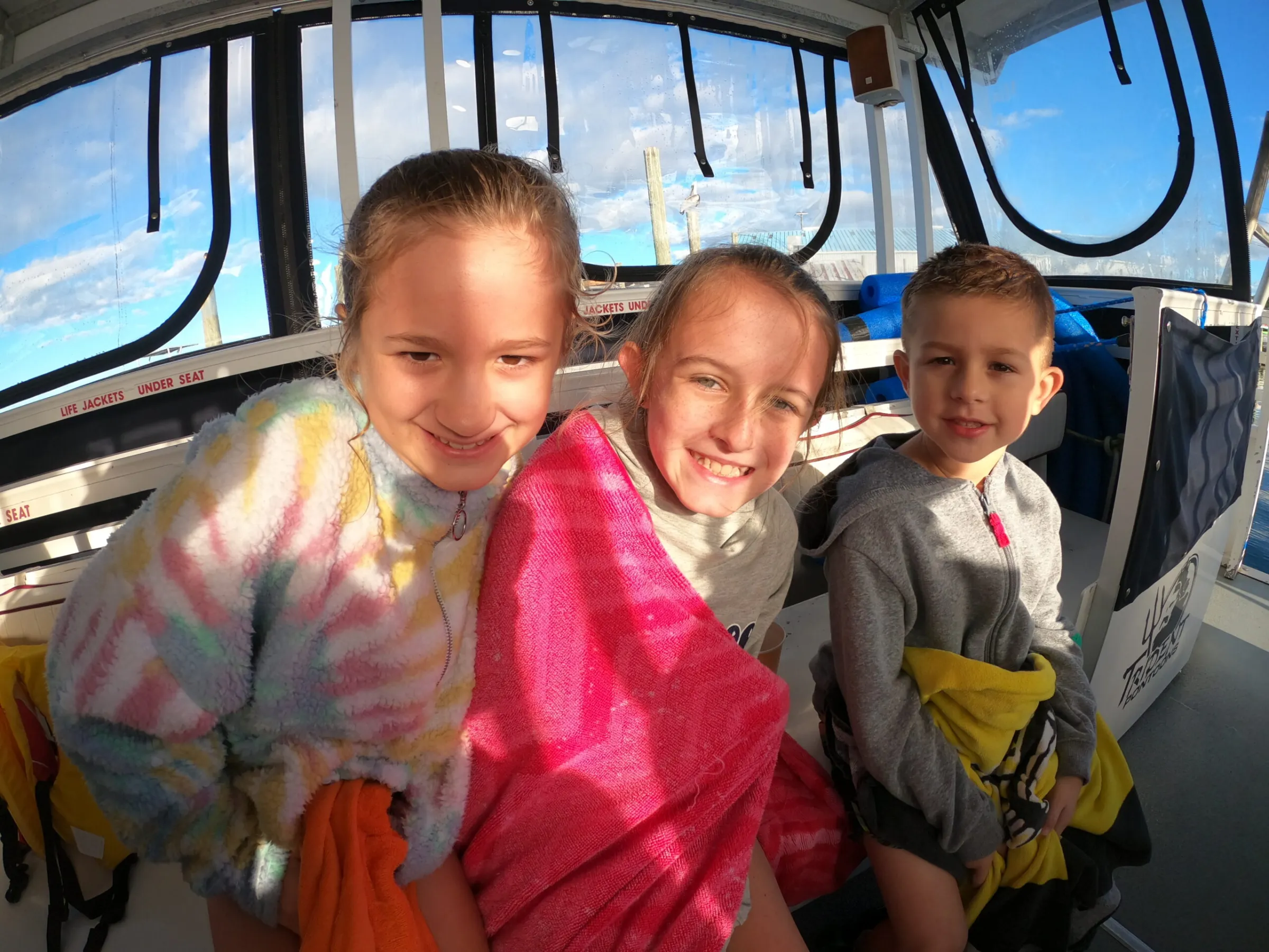 All smiles after swimming with manatees.