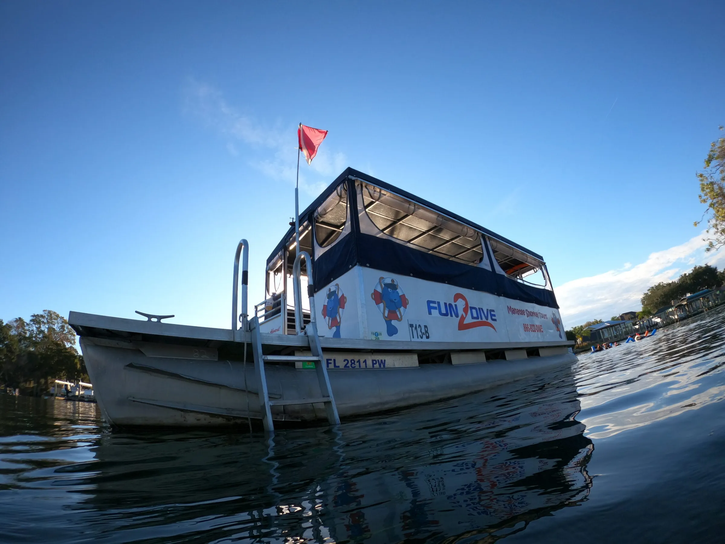 Fun 2 Dive tour boat on site with manatees.
