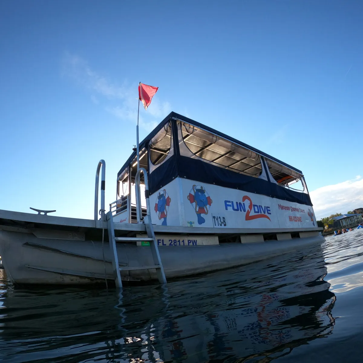 Fun 2 Dive manatee tour boat at anchor.