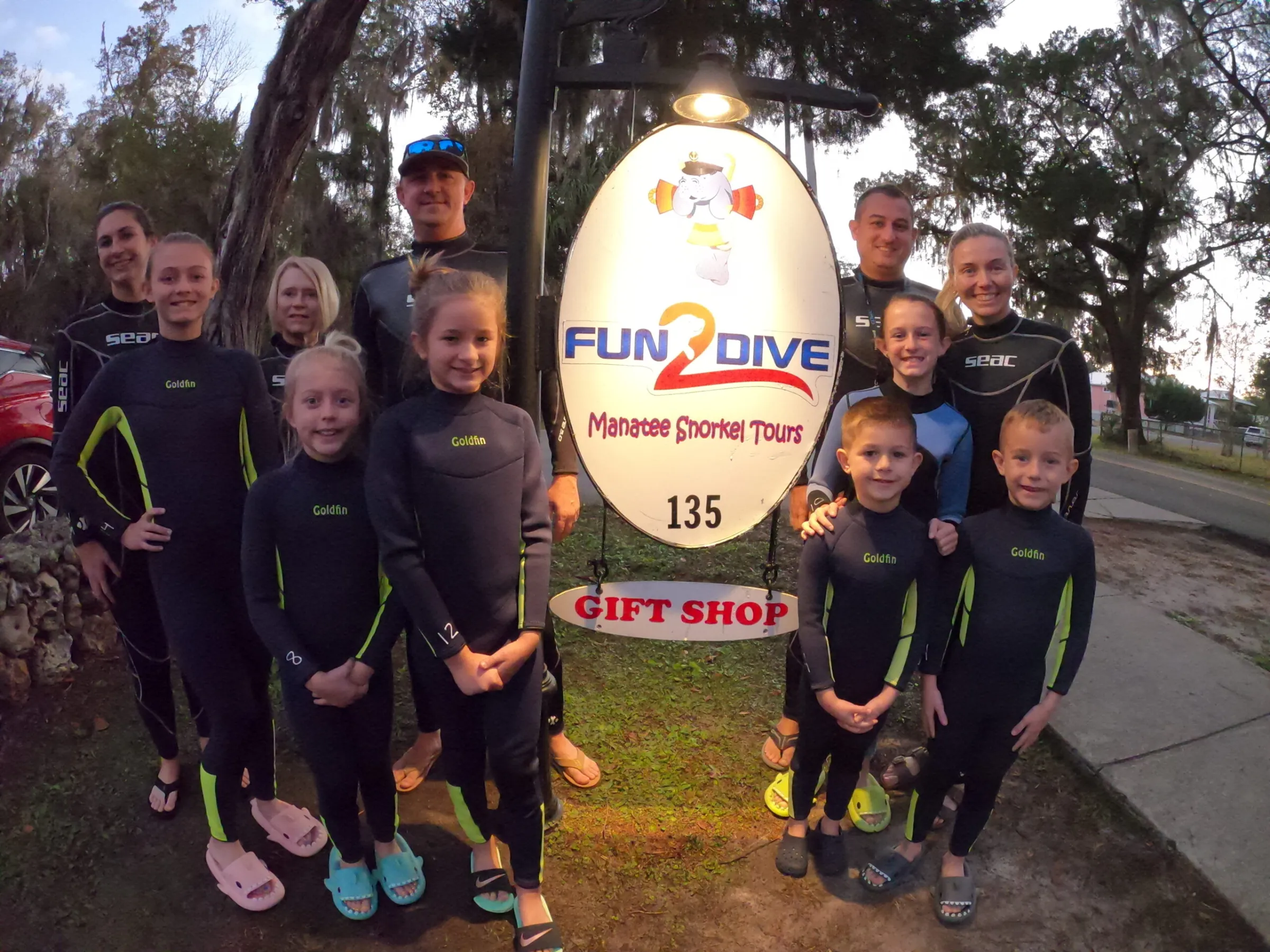 A group of guests ready to board the boat.