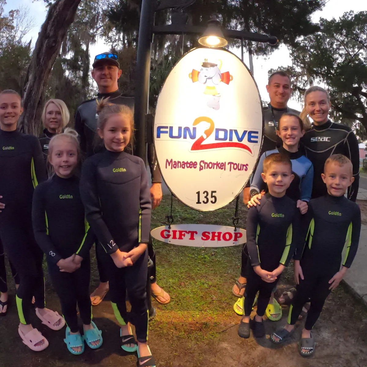 A group of guests ready to board the boat.