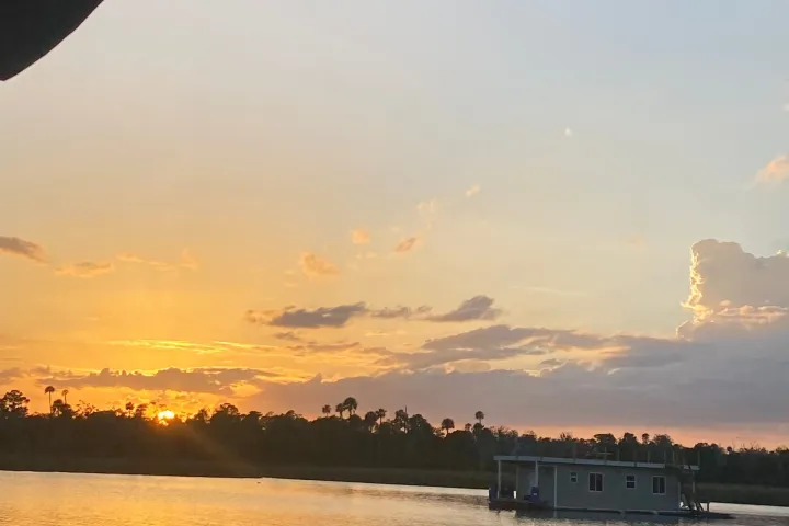 a sunset over a body of water